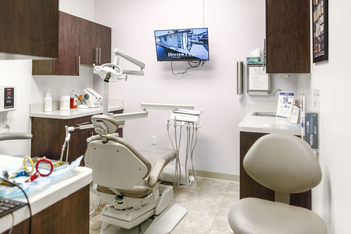 Modern dental operatory with exam chair at Estero Bay Dental